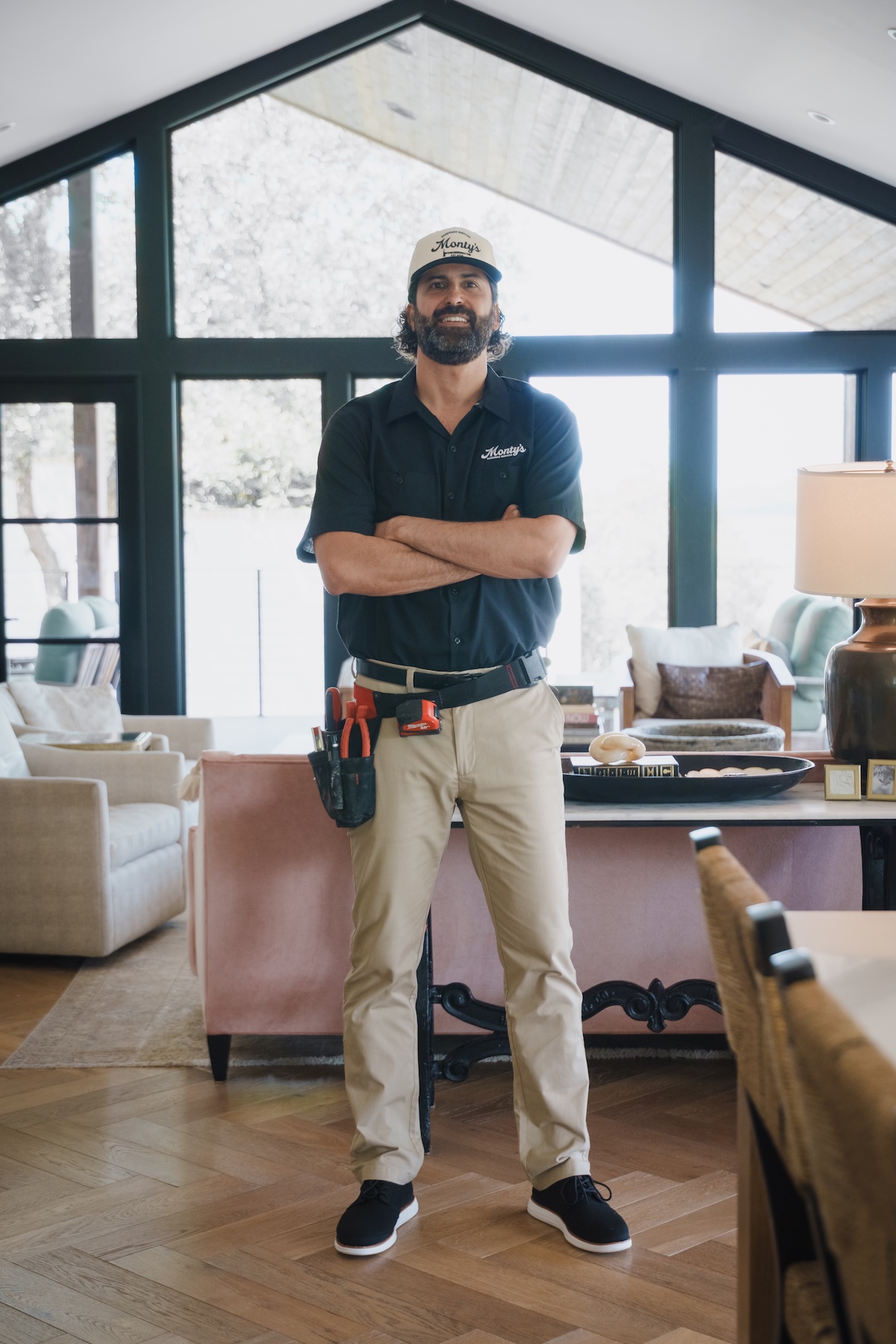 Professional handyman with tool belt
