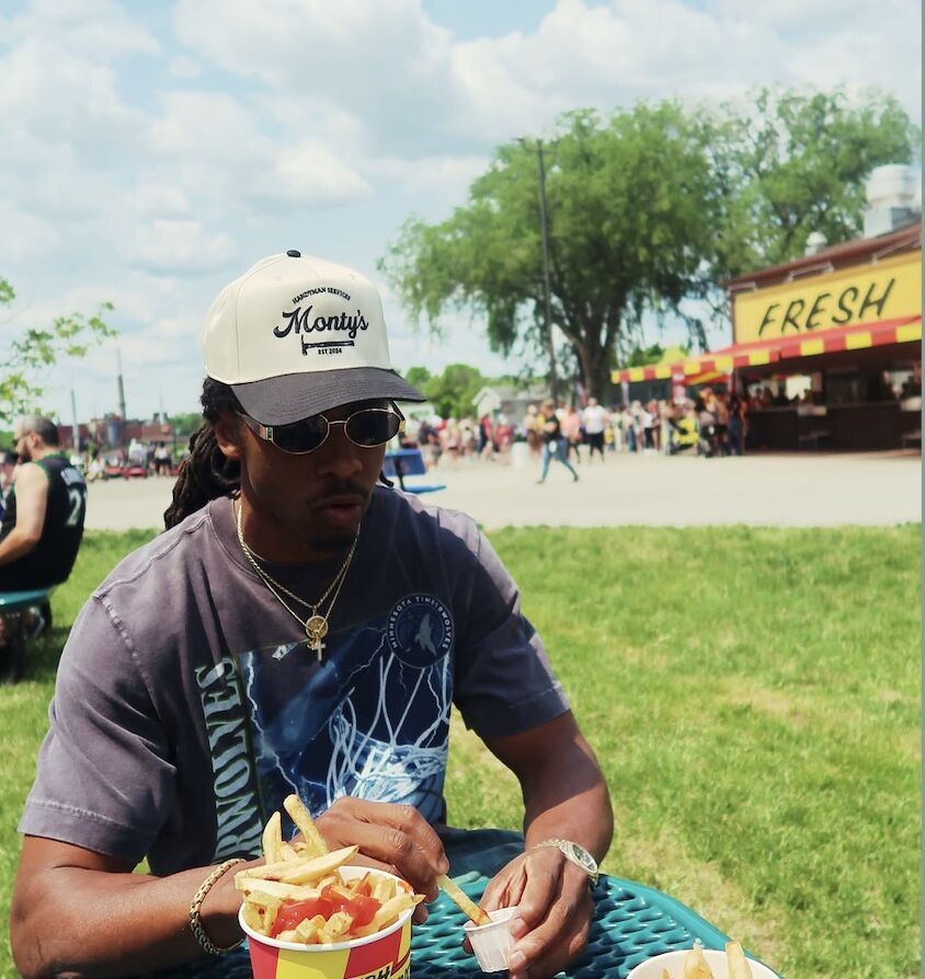Monty's team member at a neighborhood community event